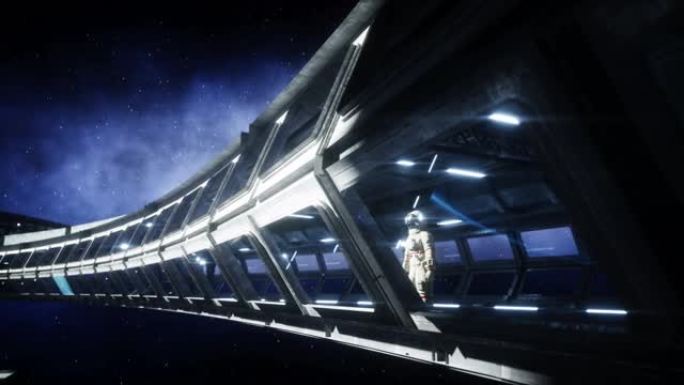 未来太空走廊里的宇航员。地球的景色。电影4k镜头。