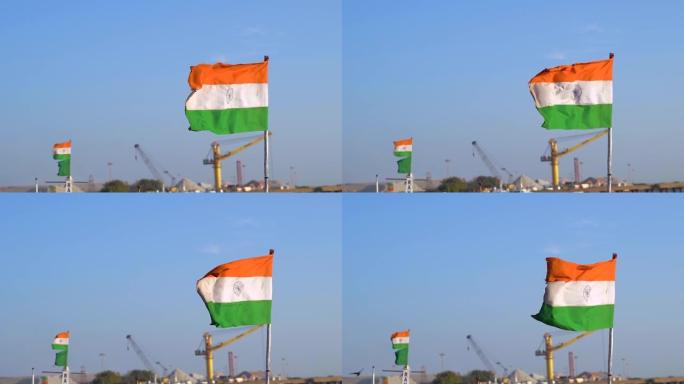 慢镜头拍摄在印度古吉拉特邦奥卡港前飘扬的印度国旗
