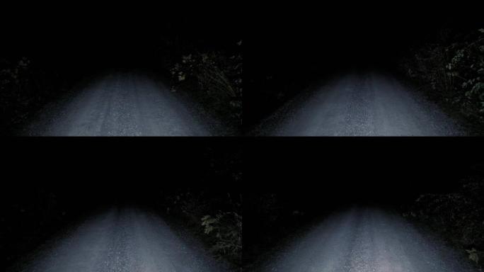 在黑暗中沿着碎石路行驶。