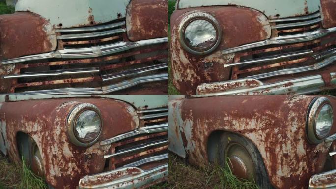 废弃生锈的老式汽车，油漆剥落，特写