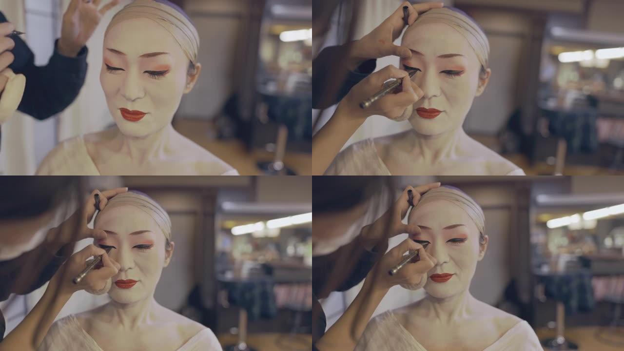 日本妇女为艺妓获得 “oshiroi' 特殊的白脸化妆