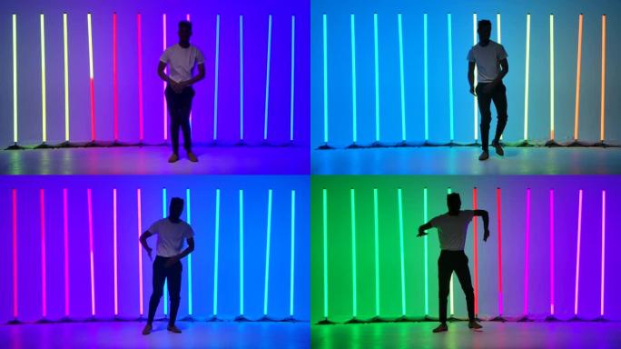 由专业交际舞演员独奏。一名黑人在工作室里的霓虹灯下跳着萨尔萨舞。慢动作