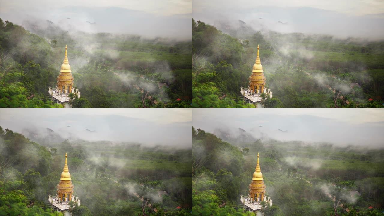 早晨越过佛教寺庙美丽的山和云