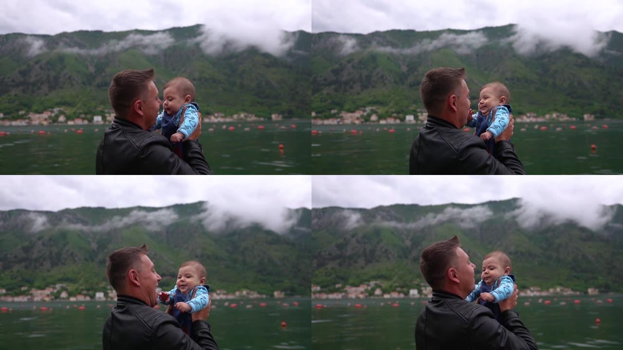 快乐的年轻父亲把他的小儿子抚养得比自己高，展现出令人惊叹的景色