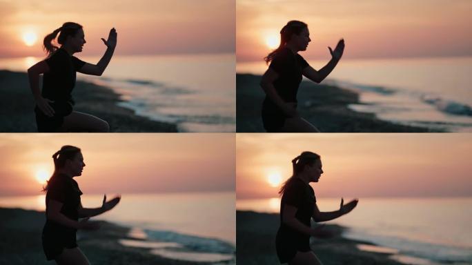 健身女人在海边训练日落与戏剧性的太阳和天空。4k Dragon RED摄像机