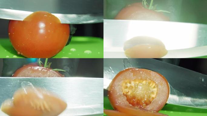 红色成熟的西红柿是用大厨刀在木板上切的，宏观，水滴
