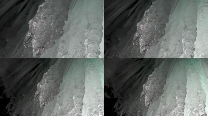 贝加尔湖天然冰川冰洞中的特写巨大冰柱霜冻。
