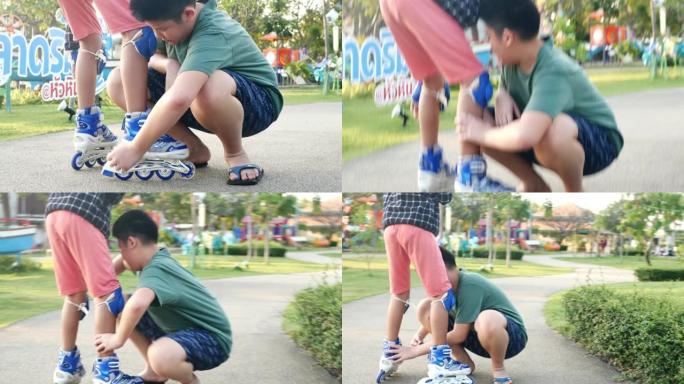 亚洲男孩检查他的妹妹滑板鞋，然后早上在公园里用太阳光玩耍，哥哥总是为爱而支持他的女孩。