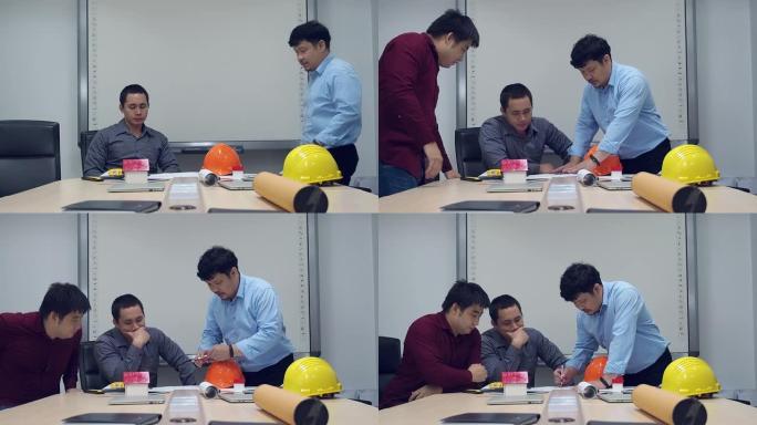 自信的建筑师团队在办公室里一起工作。