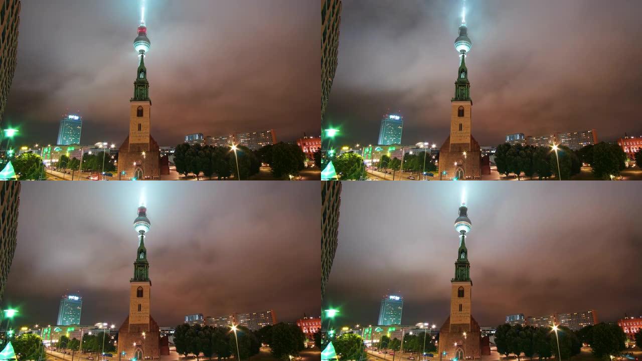 柏林亚历山大广场电视塔和圣玛丽教堂在前面，有雾的天气和云层经过，晚上德国首都市中心的时间流逝
