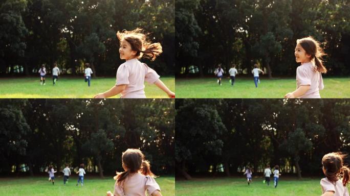 快乐的小女孩在公园里跑步