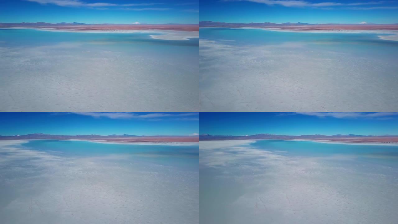 玻利维亚的Uyuni saltflat。玻利维亚高原著名的乌尤尼盐滩覆盖着薄薄的水的鸟瞰图