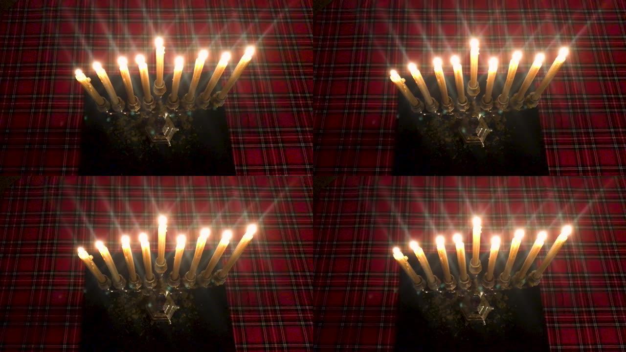 光明节。带有燃烧蜡烛的烛台的俯视图。在红色方格桌布的背景上