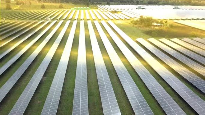 太阳能板农场日出时绿色可再生能源的未来是太阳