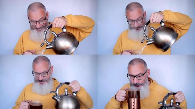 愚蠢开朗的大胡子成熟男人在法国媒体上从水壶里倒开水煮咖啡。早上好概念。灰色背景。