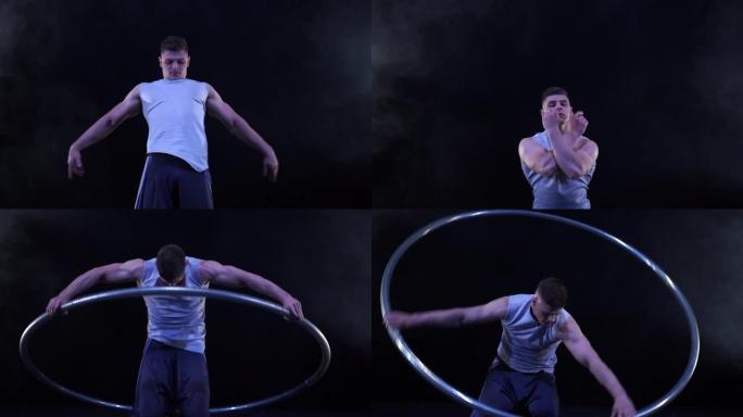 马戏团艺术家用金属轮慢动作跳舞。运动和流动时间的概念