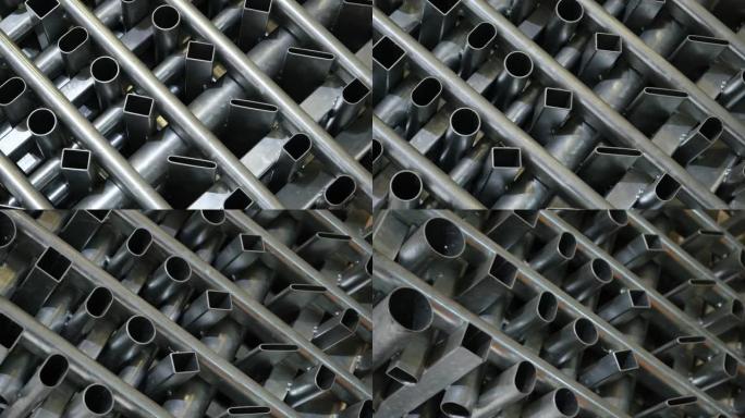 各种尺寸和厚度的工业中使用的金属管旋转并显示。