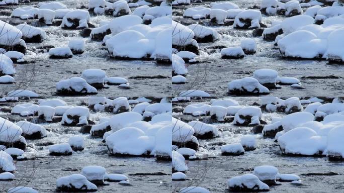 雪落北海道森林溪雪山溪流雪山流水雪覆盖石