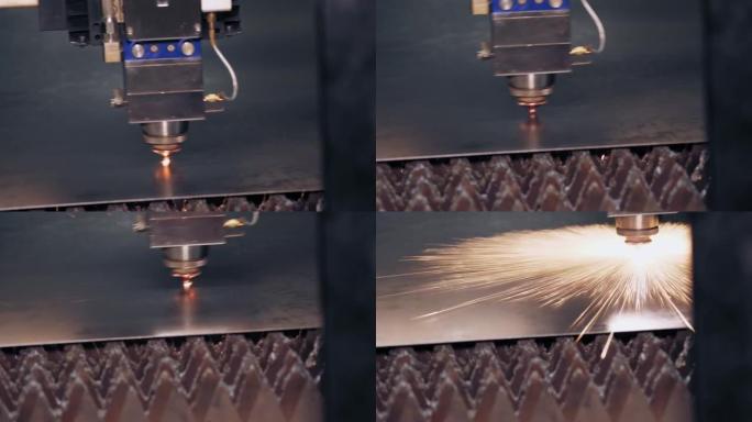 钣金激光切割机。特写。现代数控光纤激光器切割金属板的机器。切割过程中，明亮的燃烧火花从激光束中飞出