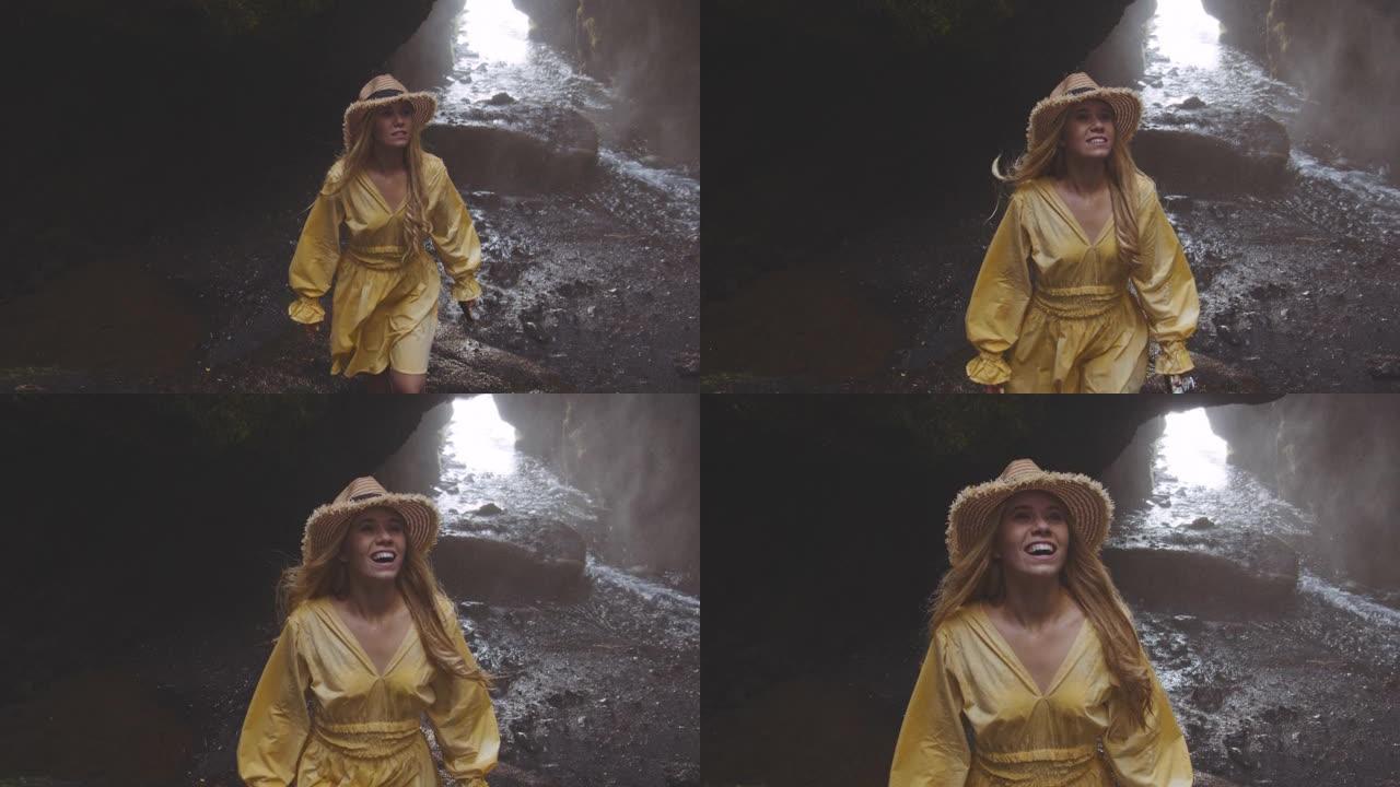 黄色的美女逼近瀑布