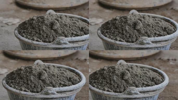 关闭砂浆桶中的混合水泥