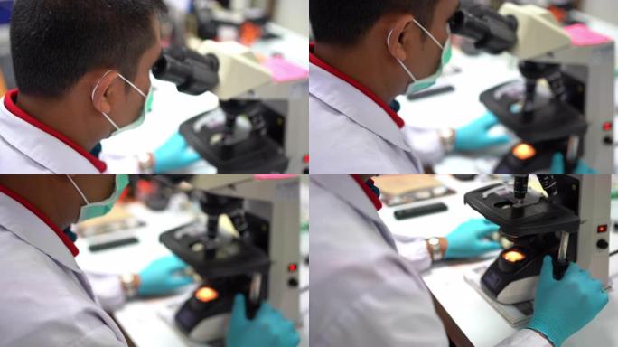 亚洲科学家在实验室工作。