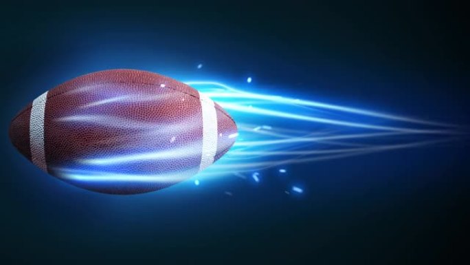 美式足球在慢动作中飞行魔术效果蓝色火焰中的能量