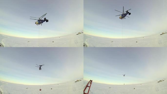 一架直升机从大西洋的破冰船上带走了货物。