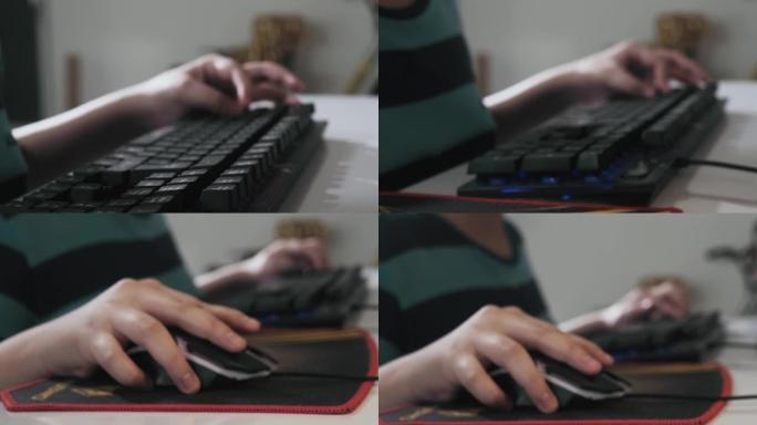 男孩的手在家里用电脑玩网络游戏，生活方式的概念。