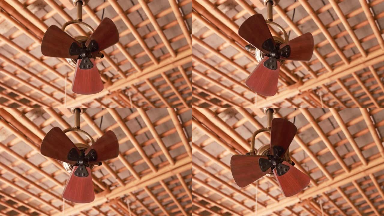 老式吊扇在房间的天花板上通电