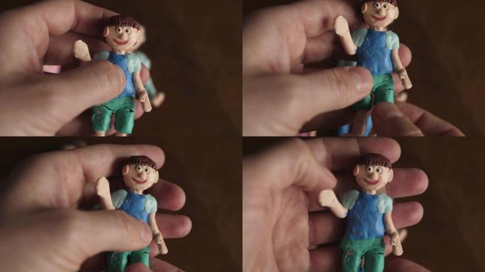 粘土制成的橡皮泥男孩雕像木偶