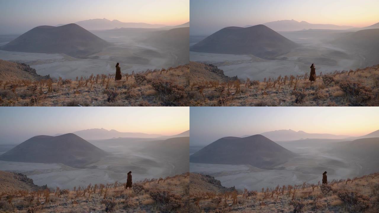 女人站着看着火山山顶山上视频素材