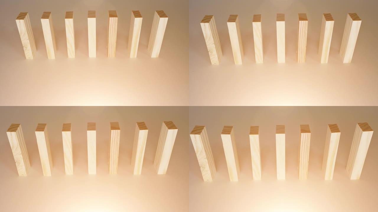 木块是堆叠的。用于多米诺骨牌游戏。阳光的动画。放大镜头。所有块都是直立的。