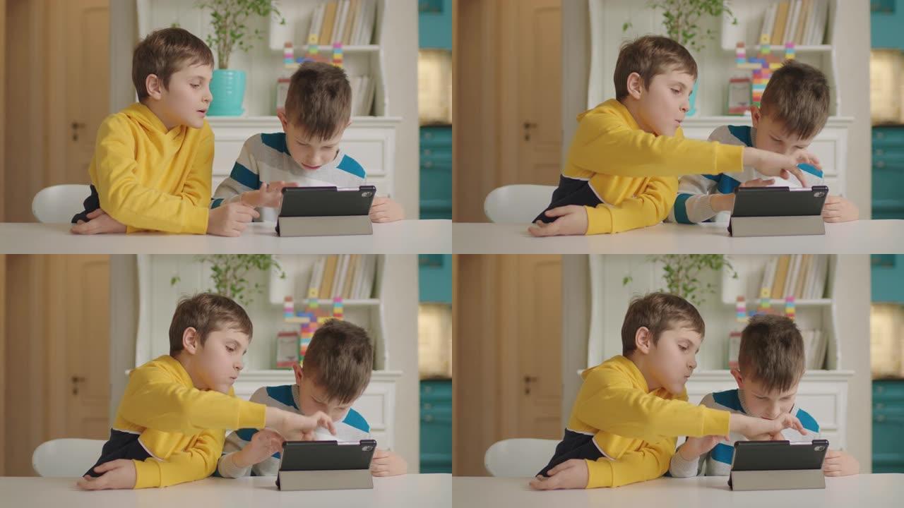 两个自闭症男孩使用一台平板电脑进行教育应用。自闭症谱系障碍在线教育。