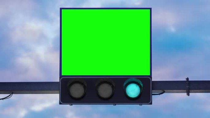 交通灯和带有绿色chromakey和云的屏幕
