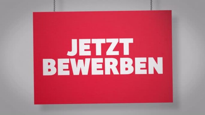 Jetzt bewerben (立即申请) 悬挂在绳索上的德国纸板标志。仅下载4k Apple Pr