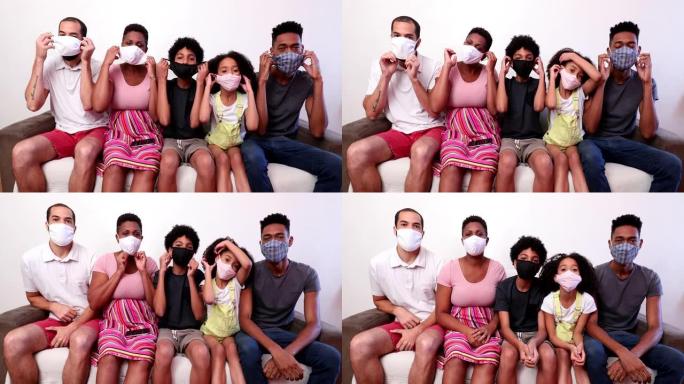 混血家庭在室内戴新型冠状病毒肺炎面罩