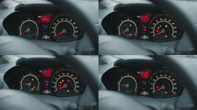 模拟汽车仪表板和车辆仪表屏幕的宽镜头，带闪烁的发光二极管灯和指示器针