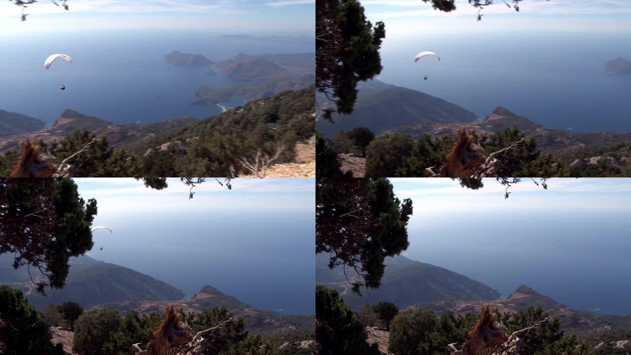来自土耳其巴巴达格山的极端滑翔伞在费蒂耶市附近。