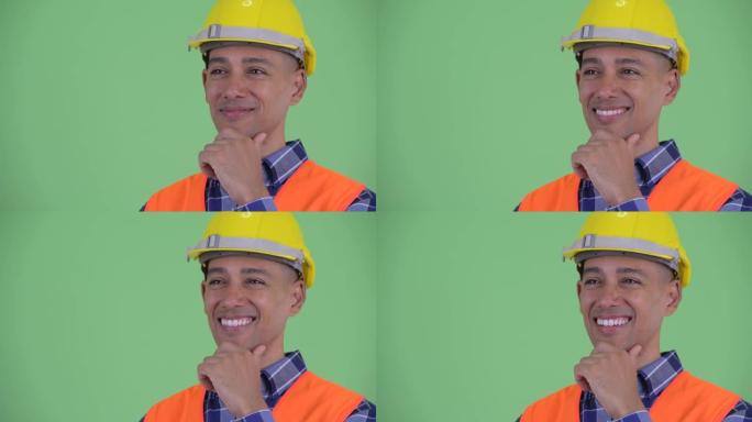 英俊的多民族男子建筑工人