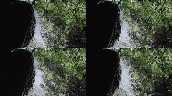 山瀑布，泼水，美丽的水滴飞溅，丛林中的瀑布。