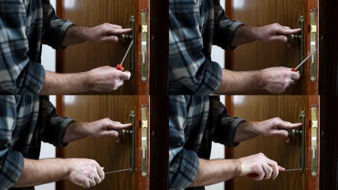 工作中的木匠修理门锁。木工。