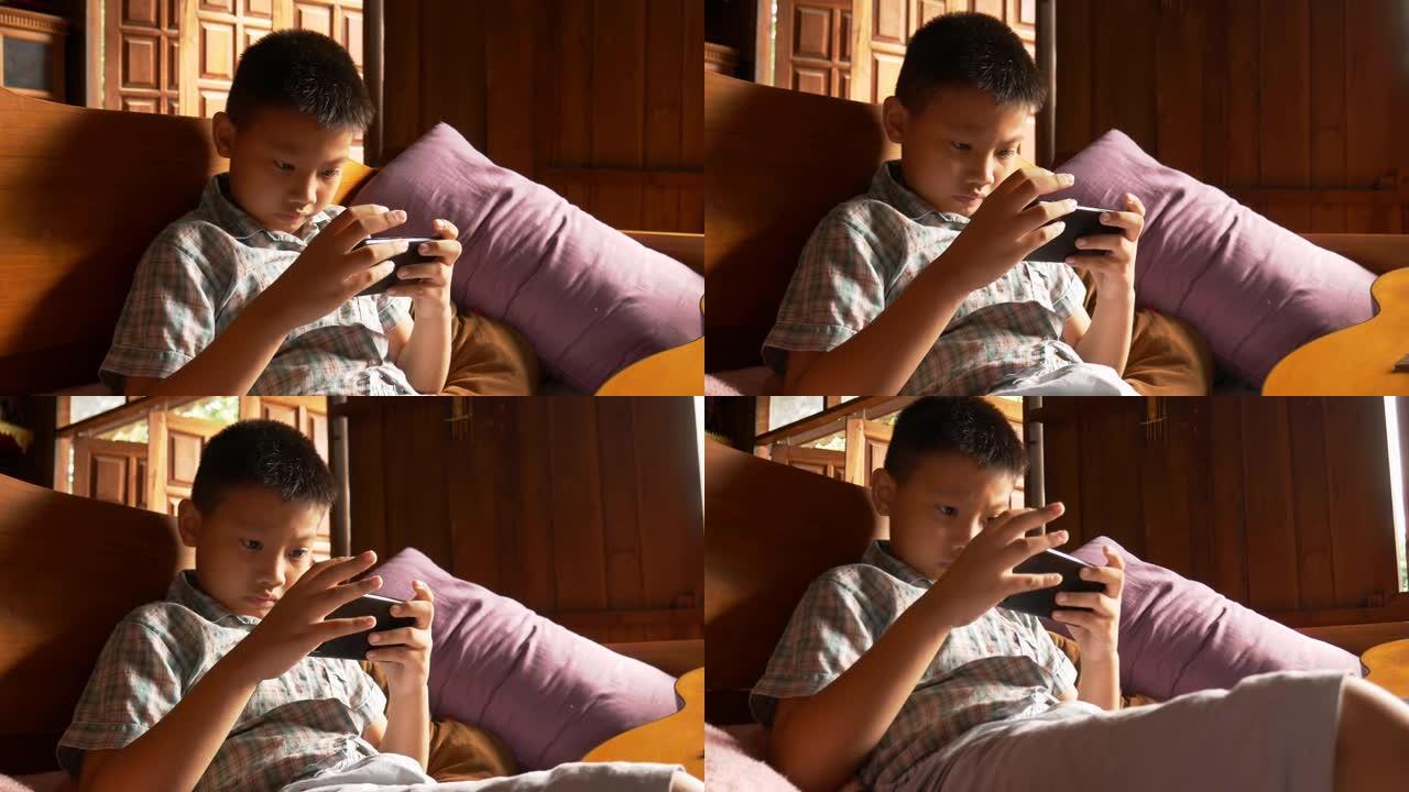 男生用手机玩游戏