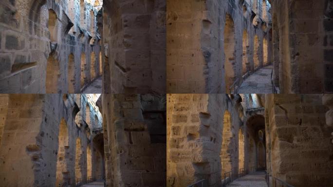 古罗马遗址。位于突尼斯El Jem的古代圆形剧场。柱子之间的通道。历史地标