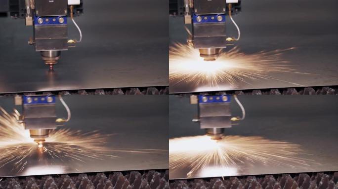 钣金激光切割机。特写。现代数控光纤激光器切割金属板的机器。切割过程中，明亮的燃烧火花从激光束中飞出