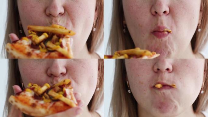 女人吃比萨饼，调皮的卡路里和有害的胆固醇。消费部分垃圾食品的人