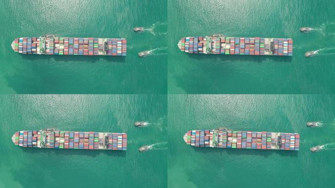 从码头商业港口的空中俯视集装箱货船运输集装箱，用于商业物流，进出口，运输或货运。