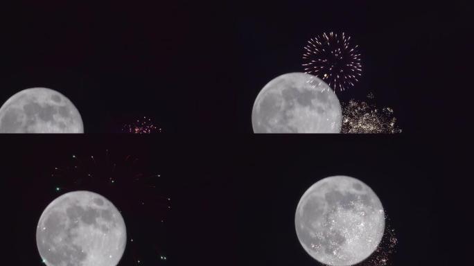巨大的满月在黑暗的天空中，美丽多彩的节日烟花在夜空中与7月4日显示独立日