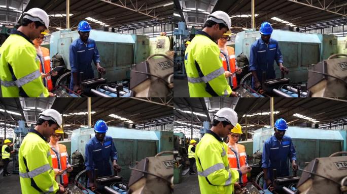 工程师和熟练的技术人员正在大型机器操作的工业设施中工作。