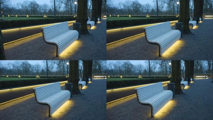 爱沙尼亚城市公园一侧的白色长椅